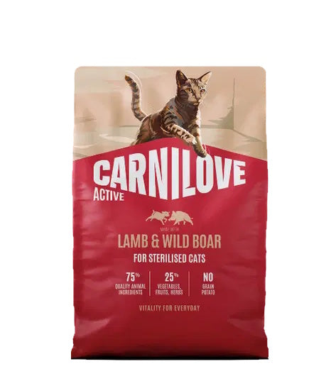 A bag of Carnilove Active Lamb & Wild Boar cat food for sterilised cats, featuring a brown tabby cat illustration on a beige background with a large red lower section and white branding.